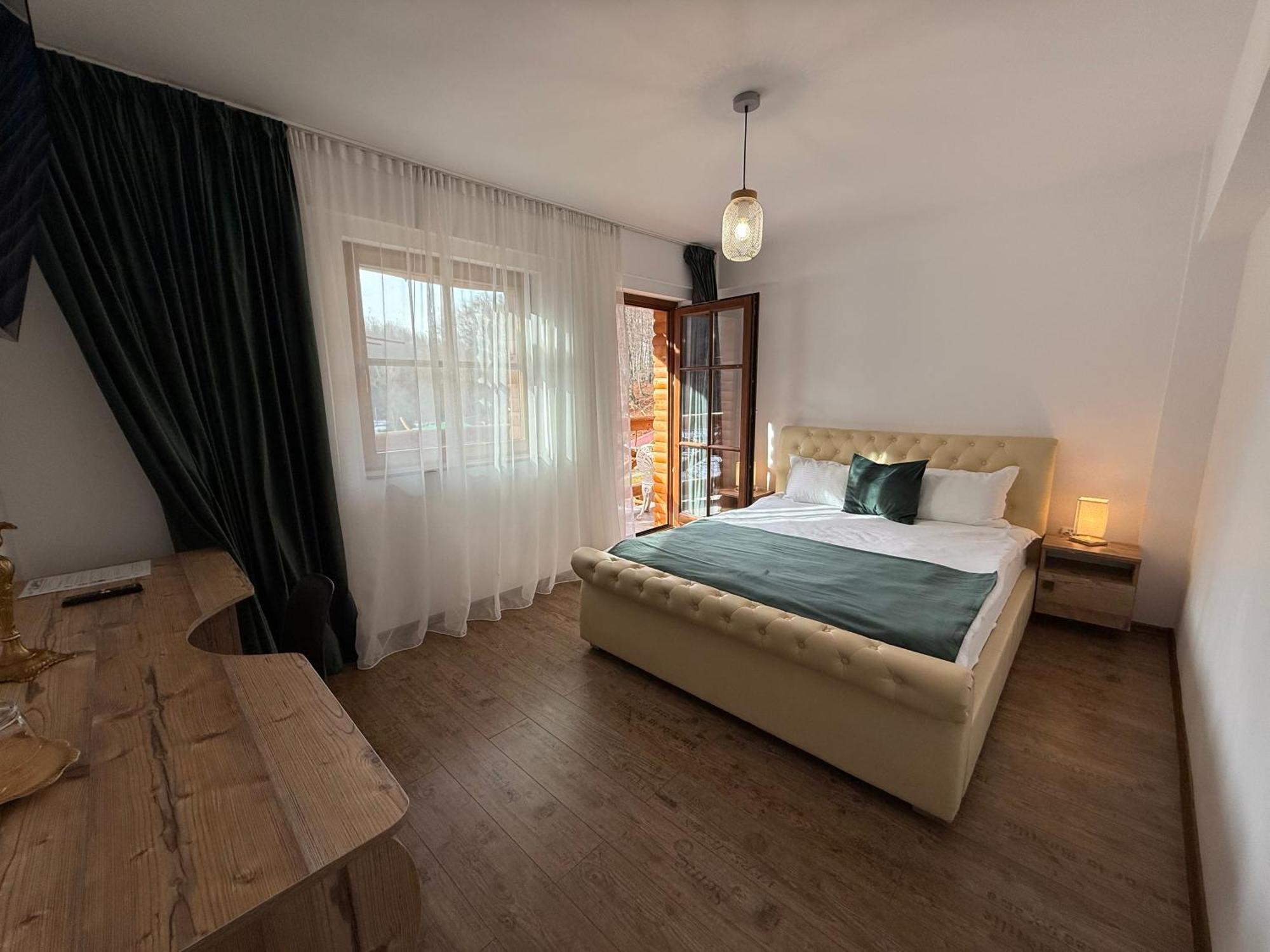 Hotel Conacul Radacinilor à Petroşani Extérieur photo